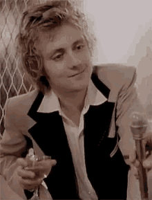 roger taylor queen band heart eyes
