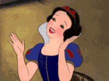 a snow white cartoon character is waving her hands in the air
