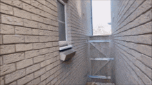 a close up of a white brick wall with a few bricks missing