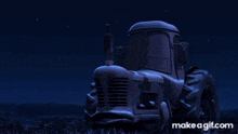 a make a gif.com screenshot of a tractor and a tow truck