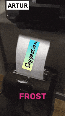 a piece of paper is being shredded and the word frost is on the bottom