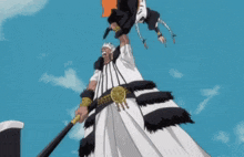 a man in a white and black striped dress holds a sword