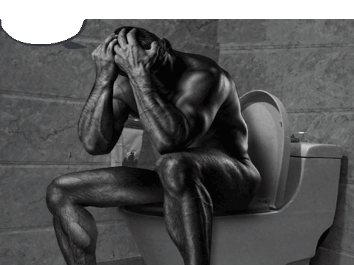 a naked man is sitting on a toilet with his head in his hands