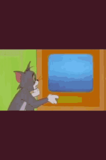a cartoon cat looking at a television screen