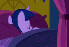 a purple pony is sleeping on a bed with purple pillows