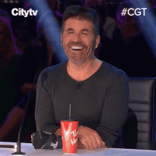 Laughing Simon Cowell GIF - Laughing Simon Cowell Canadas Got Talent GIFs