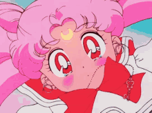 a girl with pink hair and a crescent moon on her head