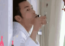 張孝全 GIF - Joseph Chang Rainie Yang Toothbrush GIFs