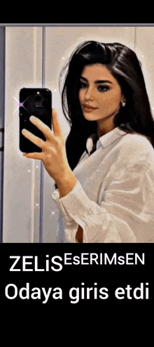 a woman is taking a selfie in front of a mirror with her phone .