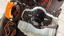 a close up of a toy with the letter s on the leg