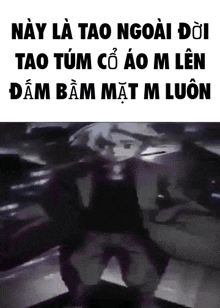 a black and white photo of a person standing in a dark room with chinese writing on it .