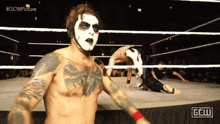 a shirtless wrestler in a wrestling ring with #gcwpicture on the bottom