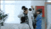 a blurry picture of a man in a lab coat