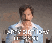 a man with a mustache is eating a piece of cake and says happy birthday leeann !!