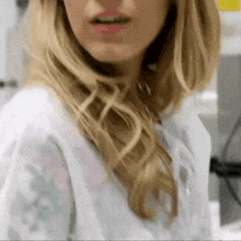 a close up of a woman 's face and hair