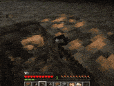 a screenshot of a video game shows a skeleton and a torch