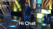 a man dancing on a stage with the words hi chat written on the bottom