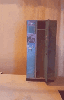 a blue locker with a sticker on it that says ' k '