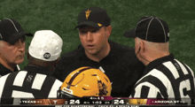 a football game between texas and arizona with a score of 24 to 24