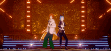 two anime characters are dancing on a stage in front of a neon background .