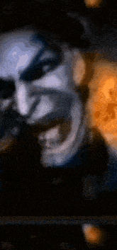 a close up of a person 's face with a very angry look on their face
