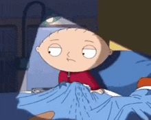 stewie from family guy is laying in bed