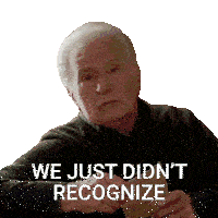 an elderly man holding a piece of paper with the words we just did n't recognize written below him