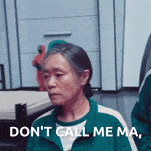 a woman says " don 't call me ma " in a green jacket