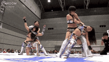the word stardom that is on a wrestling mat
