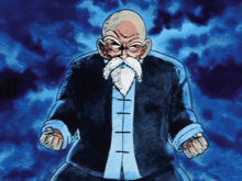 a man with a beard and a black shirt has his fists in the air
