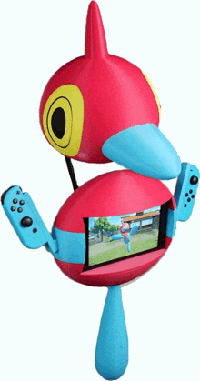 a red and blue toy with a nintendo switch controller on it
