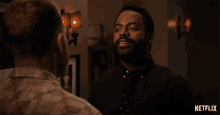 a netflix advertisement shows a man asking another man are you serious