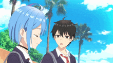 a boy and a girl are standing in front of palm trees