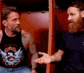 a man in a tank top that says punk on it