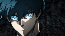 a close up of a person 's face with a blue eye