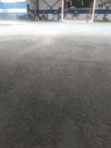 a black asphalt road with a white line on the right