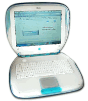 a blue and white ibook laptop is open to a page that says introducing more mac mini