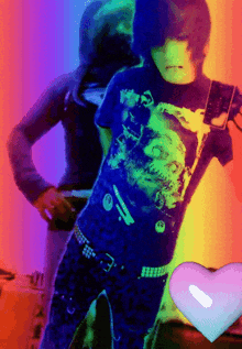 a person wearing a shirt with a skull on it stands in front of a rainbow background