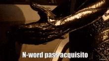 a close up of a person 's hand with the words `` n-word pass acquisito '' written on it .