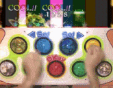 a person is playing a video game with the words cool written on the screen