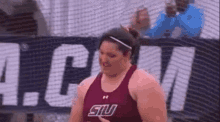 a female athlete wearing a shirt that says siu on it