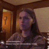 a girl with long hair is playing all the versions over the speakers at work