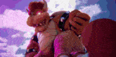 a pixelated image of bowser holding a red ball