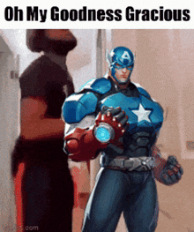 a man in a captain america costume is standing next to another man