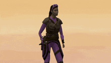 a woman in a purple and black outfit holds a gun