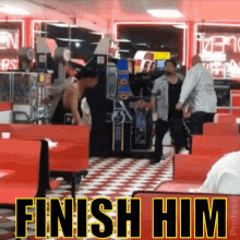a man is standing in a diner with the words finish him