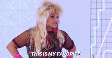 a woman says this is my favorite while wearing a mohawk wig