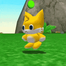 a yellow cartoon character is jumping in the air with a green ball in the background .