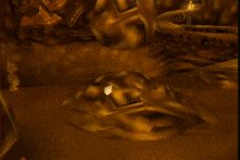 a cartoon character is standing in a cave with a torch