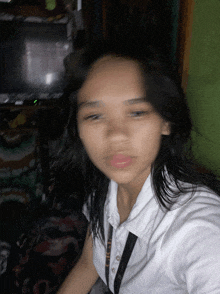 a blurry picture of a girl wearing a white shirt that says lcsd